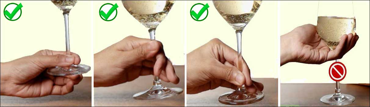 Tenir un verre de vin